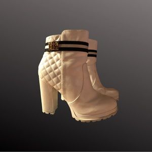 White ankle boots size 9.